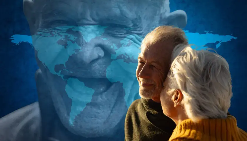 Ett äldre par omfamnar varandra, med en världskarta överlagd på en äldre mans ansikte. Kanske en symbol för blå zoner i Sverige och global hälsa.