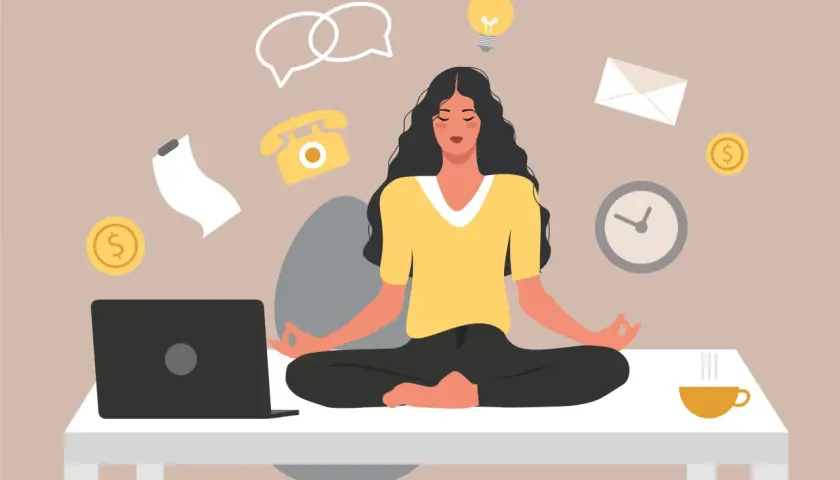 Kvinna mediterar vid skrivbordet, omgiven av symboler för arbete och stress. Hon hittar lugn med mediyoga online gratis.