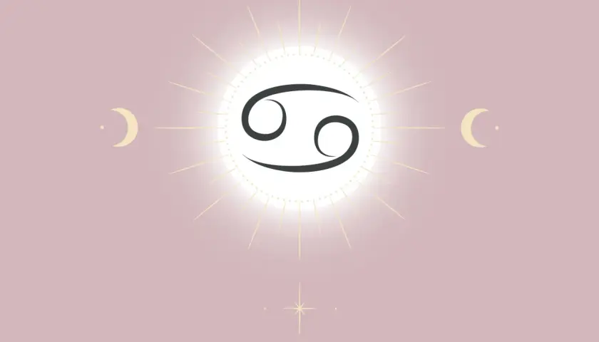 Stjärntecknet Kräftan, omgivet av en solstråle och månar. En symbol för ascendent kräfta.